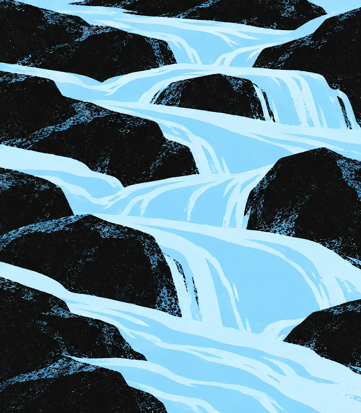 Pale blue water cascading over dark boulders.