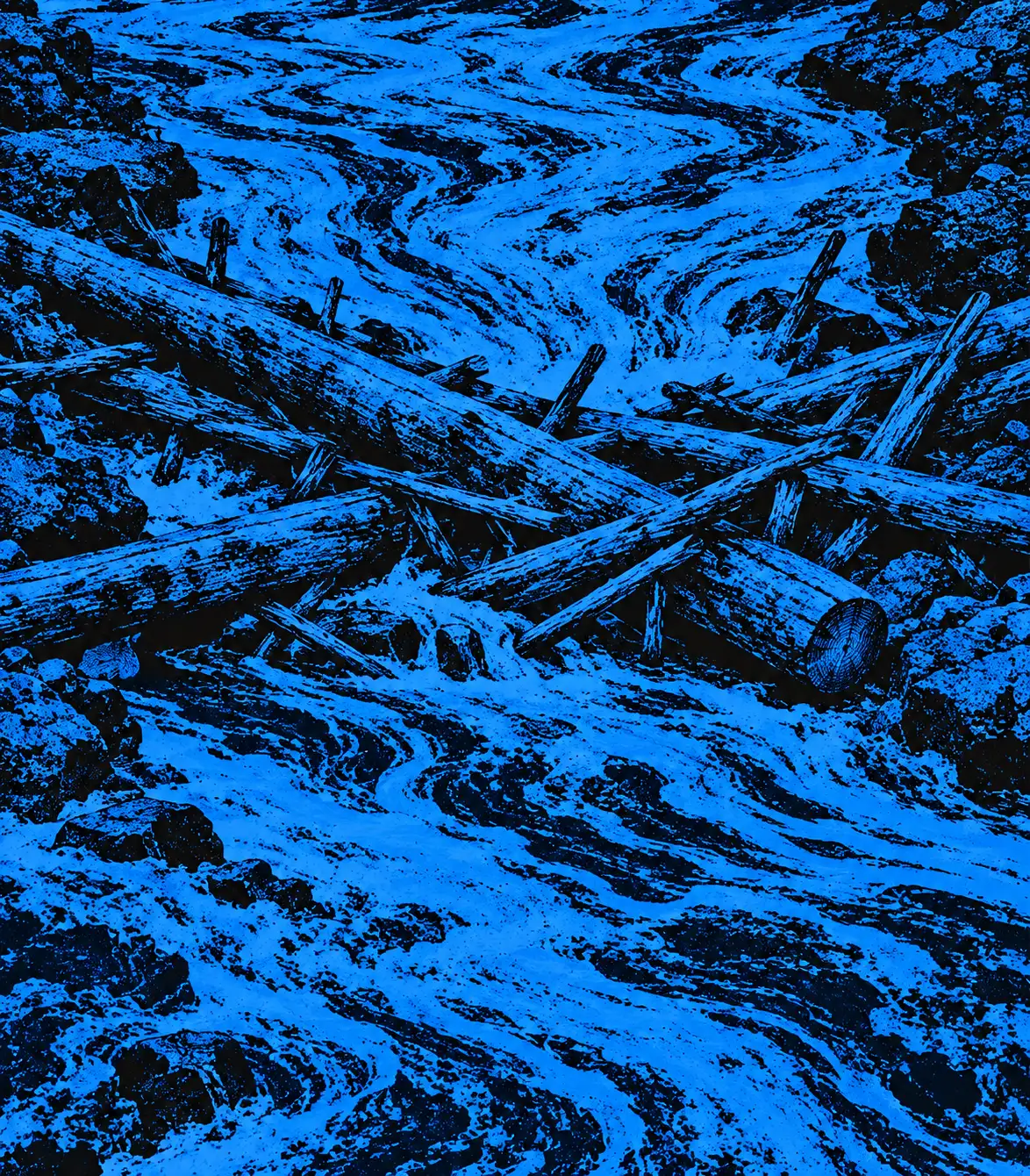 Logs jammed across a fast-flowing river.